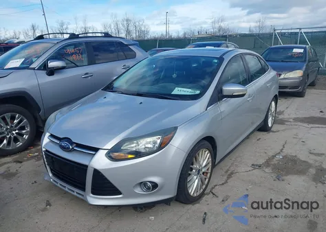 2014 Ford Focus Titanium из США, поврежденный, VIN 1FADP3J26EL404933